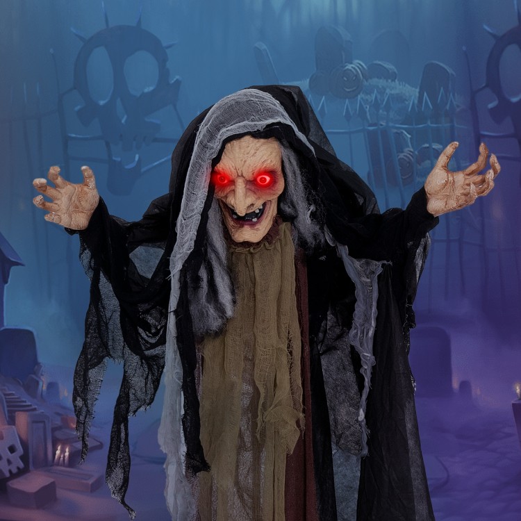 Life-size animatronic witch showcasing posable arms and glowing red eyes, ideal for creating a spooky ambiance at.