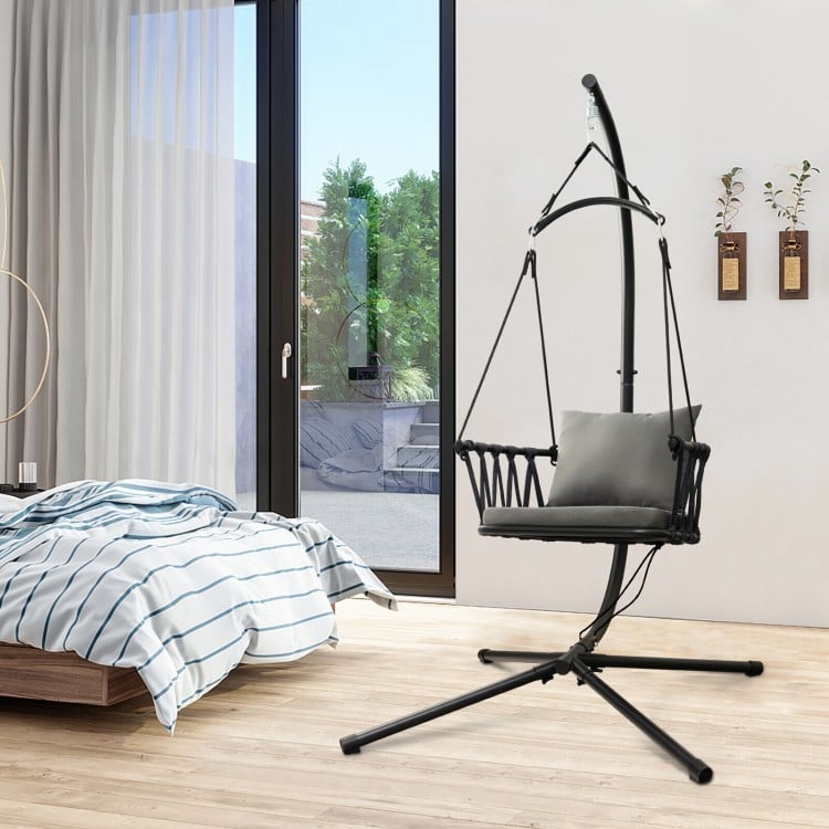 Hanging swing chair with stand in gray, featuring soft cushions and a reinforced metal stand for indoor or outdoor use.
