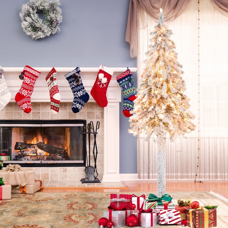 Snow-flocked 6 feet pre-lit slim pencil Christmas tree with warm lights, perfect for festive home decor.