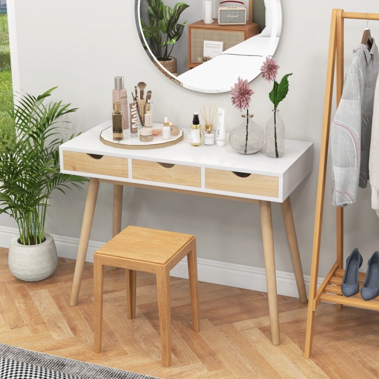 Computer desk with three drawers and solid rubber wood legs, perfect for home office or makeup table use.