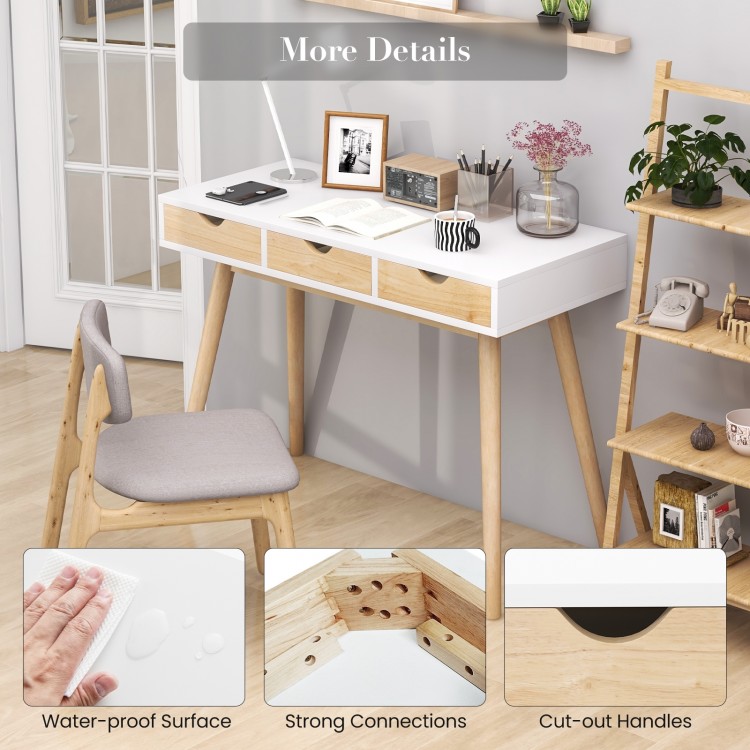 Computer desk with three drawers, solid rubber wood legs, and a waterproof surface, ideal for home office use.