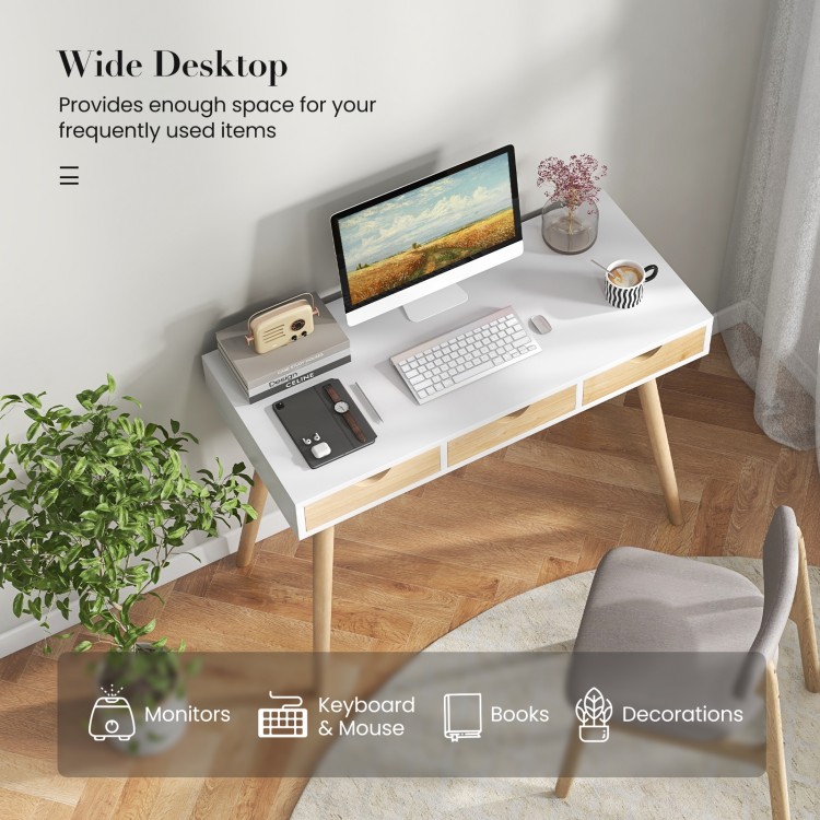 Computer desk with wide desktop and 3 drawers, featuring solid rubber wood legs, perfect for home office organization.