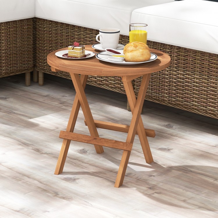 Round folding coffee table made of teak wood, featuring a slatted tabletop, ideal for outdoor use and easy carrying.