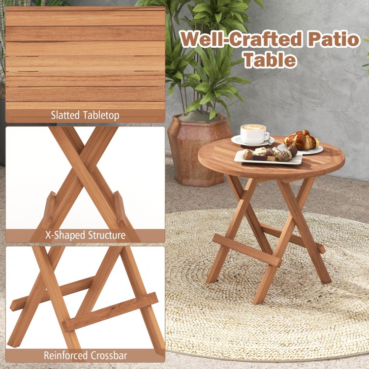 Round patio folding coffee table made of teak wood with slatted tabletop, ideal for picnics and camping.