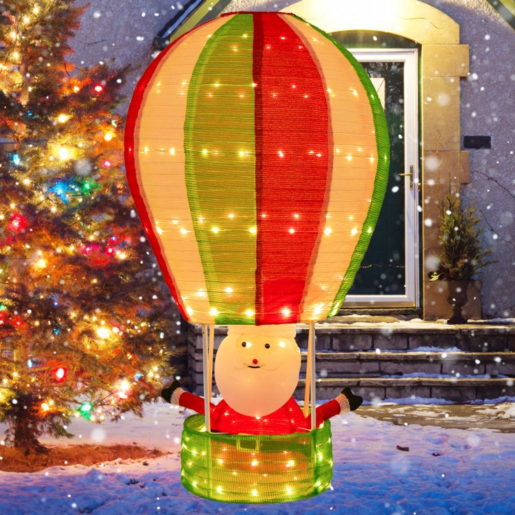 Santa Claus in a colorful hot air balloon with warm lights, perfect for festive outdoor Christmas decorations.