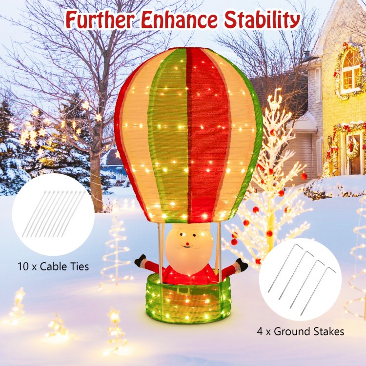 Santa Claus in a hot air balloon with warm lights, perfect for festive lawn decoration during Christmas celebrations.