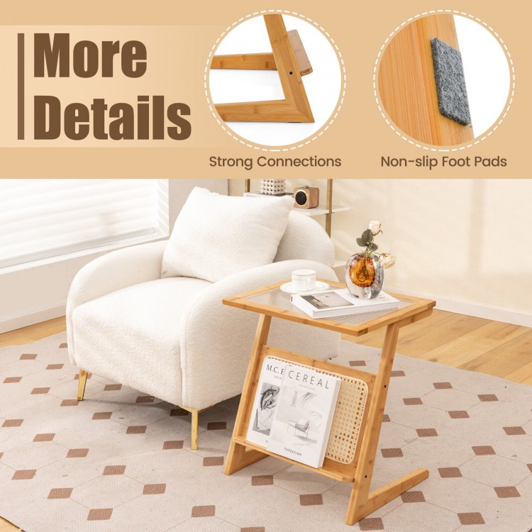 Z-shaped end table with rattan shelf and glass top, featuring non-slip foot pads for stability in narrow spaces.