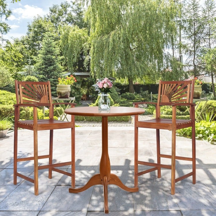 Two outdoor acacia wood bar chairs with sunflower backrest, perfect for patio relaxation and stylish seating.
