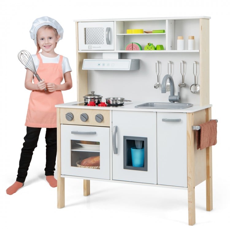 Wooden pretend play kitchen set for toddlers in white, featuring stove, sink, and microwave for imaginative play.