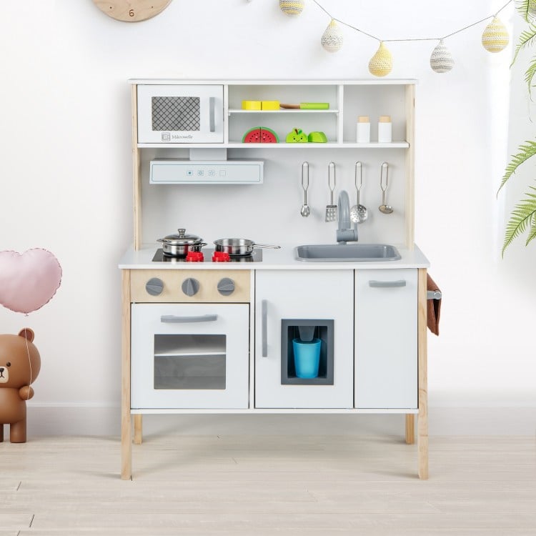 Wooden pretend play kitchen set for toddlers in white with removable sink, stove, and storage for imaginative play.