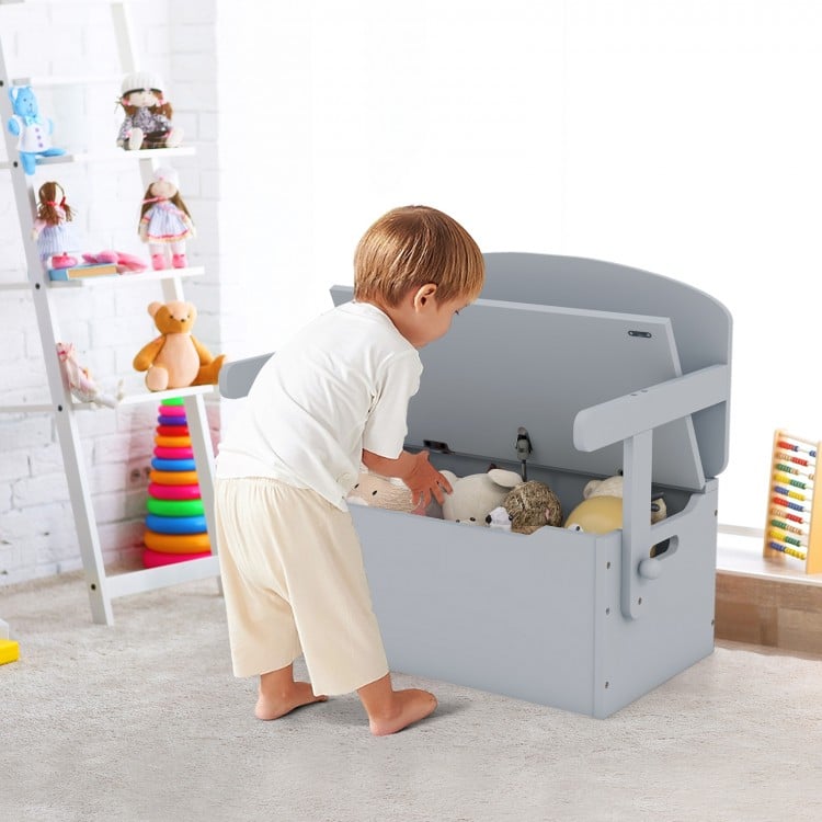 Gray 3-in-1 kids storage bench with a child organizing toys, featuring a safe wooden structure and ergonomic design.