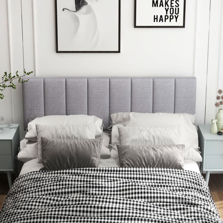 Gray linen upholstered headboard with vertical channel tufting and solid wood legs, perfect for full or queen size beds.