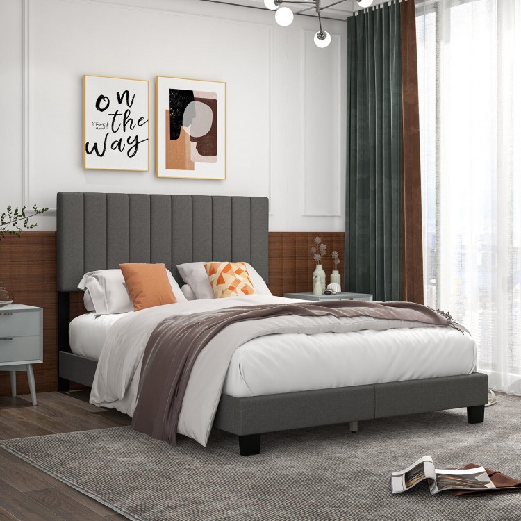 Queen size upholstered bed frame with gray vertical channel tufted headboard, perfect for modern bedroom decor.