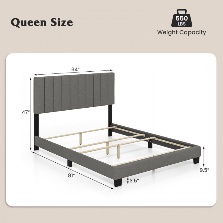 Queen size upholstered bed frame in gray with vertical channel tufted headboard, solid wood legs, and adjustable foot.