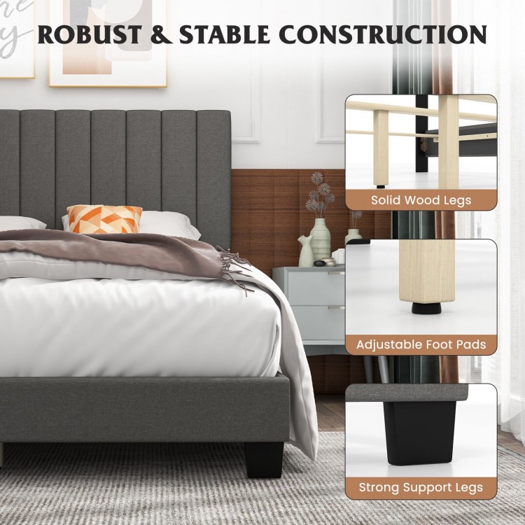 Queen size upholstered bed frame with gray vertical channel tufted headboard and solid wood legs for stability.