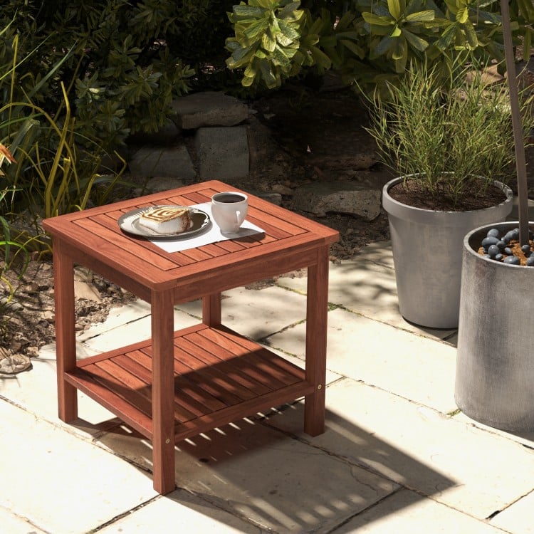 Double-tier acacia wood patio side table with slatted top, perfect for drinks and snacks by the poolside or balcony.