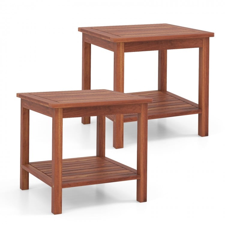 Double-tier acacia wood patio side tables with slatted tops and shelves, perfect for backyard or poolside use.