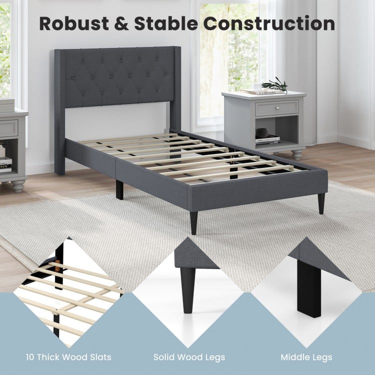 Twin size upholstered platform bed in gray with button tufted wingback headboard and solid wood legs for stability.