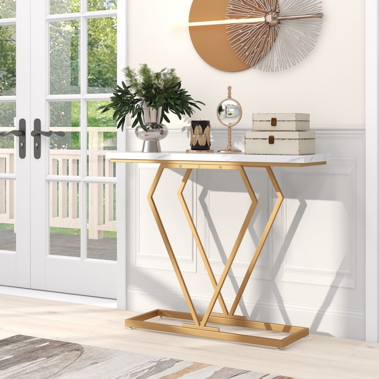 Gold console table with diamond-shaped geometric frame and white faux marble top, perfect for narrow spaces.
