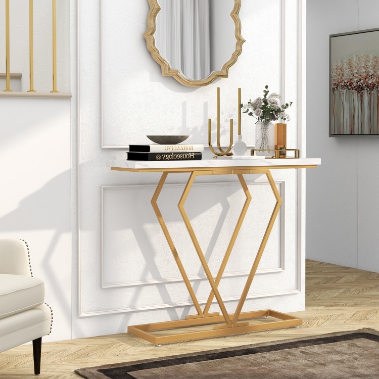 Gold console table with a diamond-shaped geometric frame and faux marble top, perfect for narrow spaces and displaying.