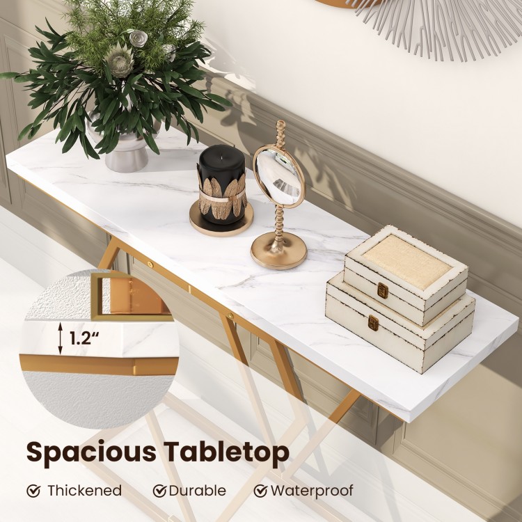 Spacious white faux marble tabletop of the gold console table with a diamond-shaped frame, ideal for displaying decor.