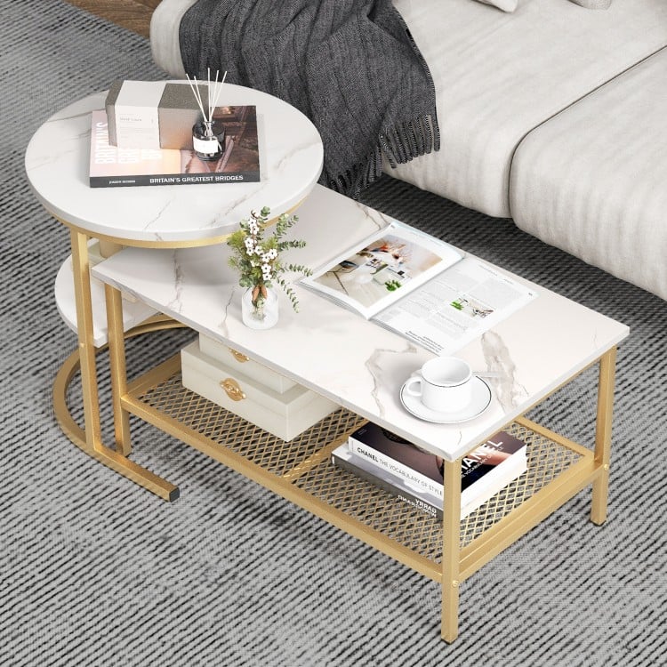 Nesting coffee table set featuring a round and oval faux marble top with golden steel frame, perfect for living room.