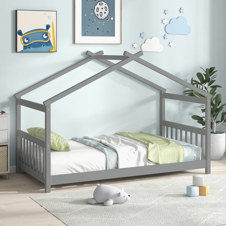 Twin size gray wooden house bed with roof design, perfect for kids' themed rooms and easy access for little ones.