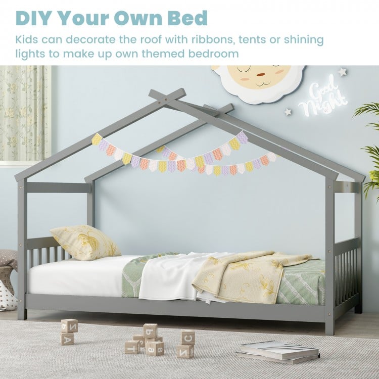 Twin size gray wooden house bed with roof, perfect for themed kids' rooms, featuring solid wood support and slats.