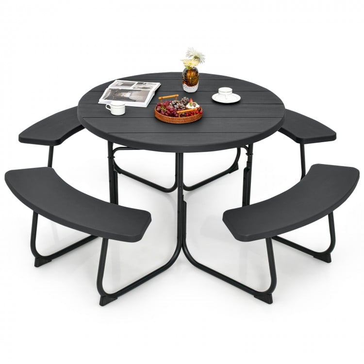 Round black 8-person outdoor picnic table set with benches and umbrella hole, ideal for gatherings and easy maintenance.
