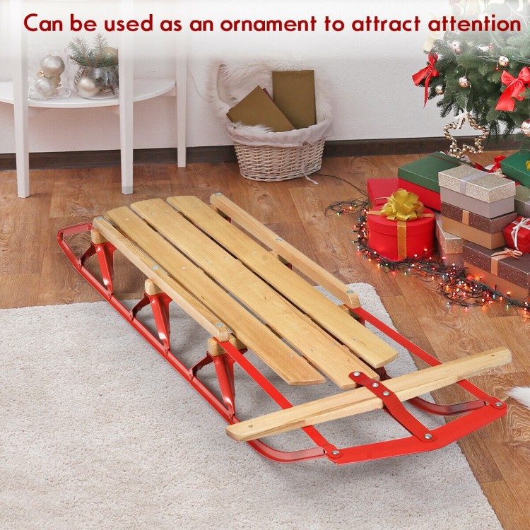 Kids wooden snow sled with metal runners, red finish, designed for smooth sliding and easy control, perfect for winter.