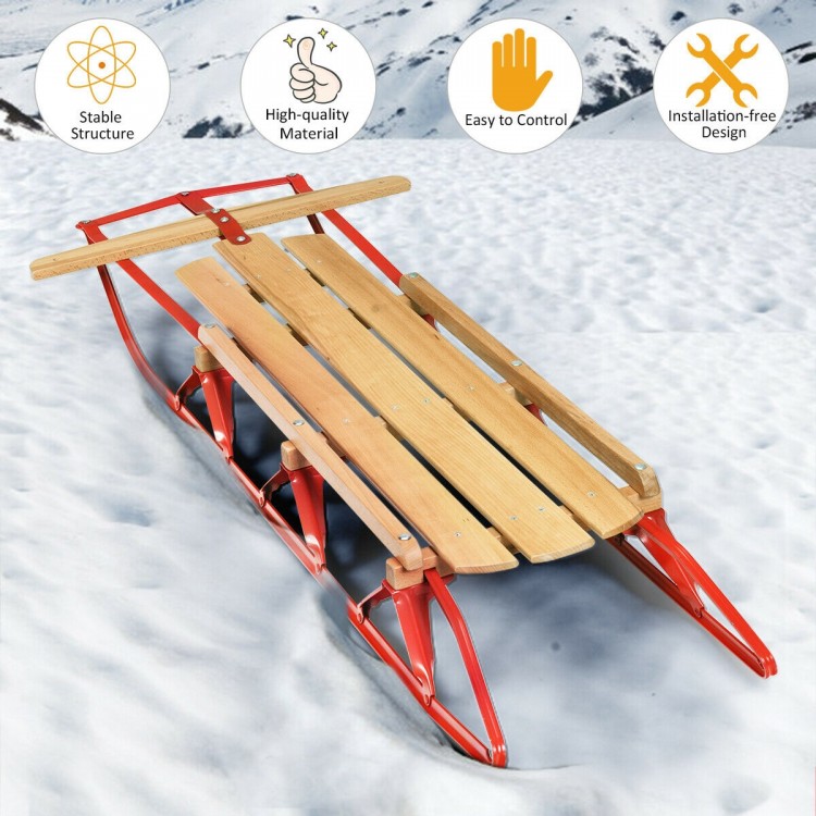 54-inch kids wooden snow sled with metal runners, steering bar, and red finish for smooth sliding in the snow.