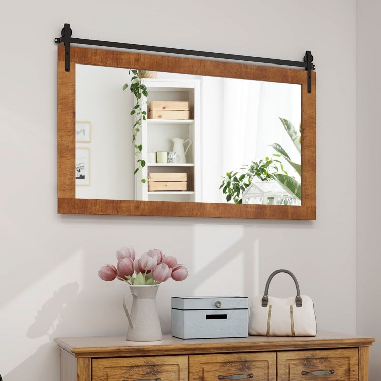 Rectangle barn door style wall-mounted mirror with solid wood frame and metal bracket, ideal for living rooms and.