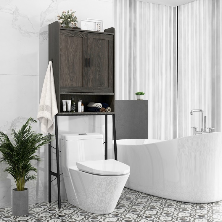 Over the toilet storage cabinet in gray with double doors and adjustable shelves, ideal for organized bathroom supplies.