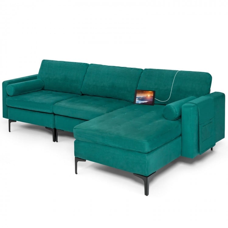 L-shaped sectional sofa in peacock blue suede with USB port, featuring ergonomic cushions and side pocket for storage.