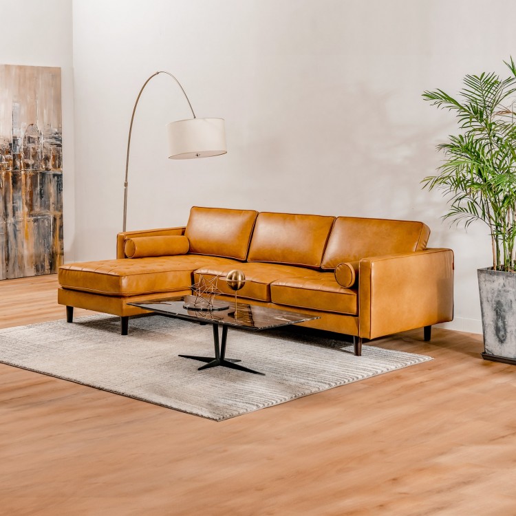 L-shaped brown sectional sofa with tufted air leather, thick cushions, and birch wood legs for living room comfort.