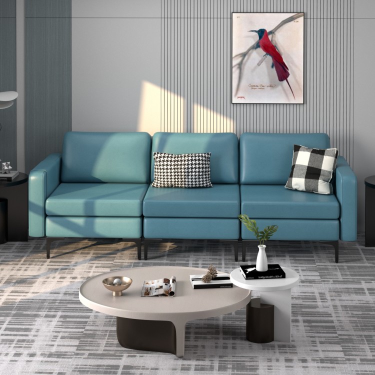 Convertible blue leather sofa couch with magazine pockets, featuring removable cushions and USB ports for modern living.