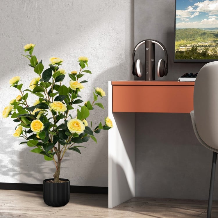 Artificial 38-inch camellia tree with multiple yellow flowers and a textured cement pot, ideal for enhancing any living.