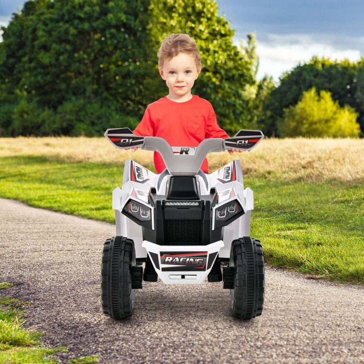 Kids ride-on ATV quad toy car in white, featuring all-terrain wheels and pedal control for outdoor play and motor skill.