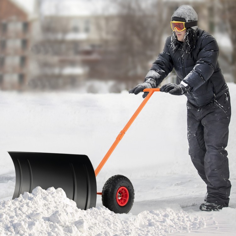 29-inch snow pusher with ergonomic handle, large wheels, and adjustable height for efficient driveway snow removal.