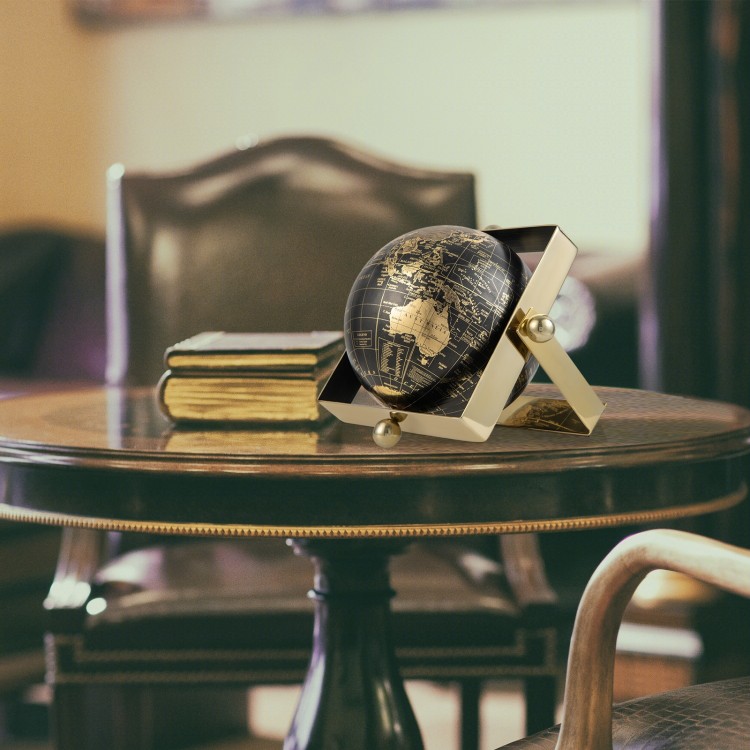 Geographic world globe with clear printing and stable metal base, perfect for indoor spaces and educational use.