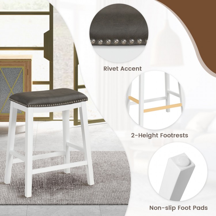 Gray upholstered 26-inch counter height bar stool with rivet accents and non-slip foot pads for stable seating.