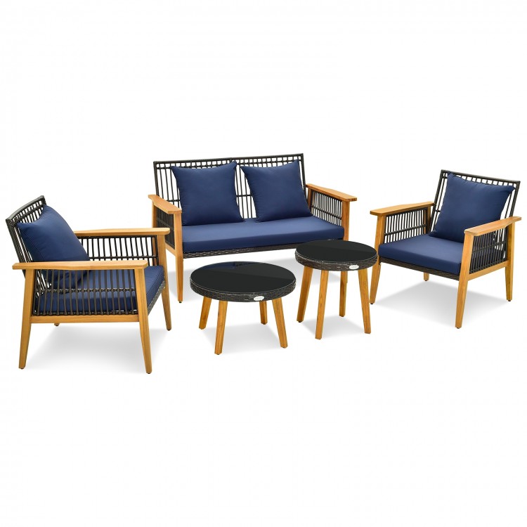 Single armchair with navy cushion and acacia wood frame, perfect for relaxing in your backyard or poolside setting.
