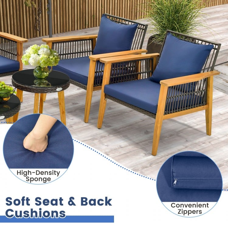 Navy blue cushions on a 5-piece outdoor conversation set with acacia wood and metal construction, ideal for poolside.