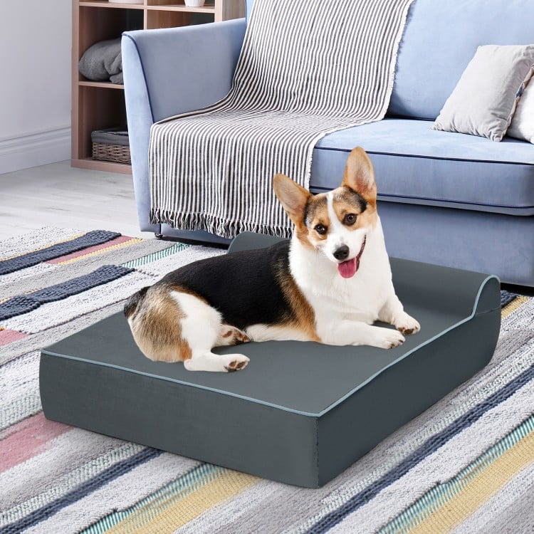 Orthopedic dog bed in grey with headrest, featuring graphene memory foam for joint support and removable washable cover.