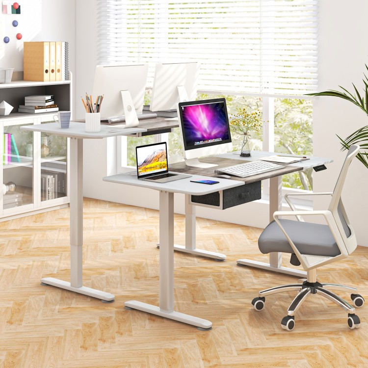 Height adjustable electric standing desk in gray with USB charging port, ideal for work or study, shown in a modern.