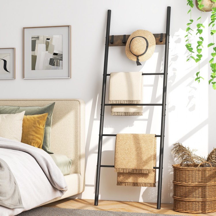 Wall-leaning decorative blanket holder with 5 removable hooks, featuring a durable metal frame, ideal for home.