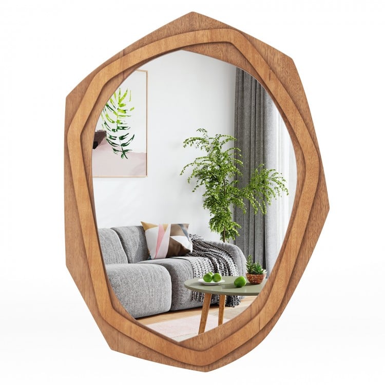 Irregular framed wall mirror with a natural finish, ideal for enhancing light in living rooms or bedrooms.