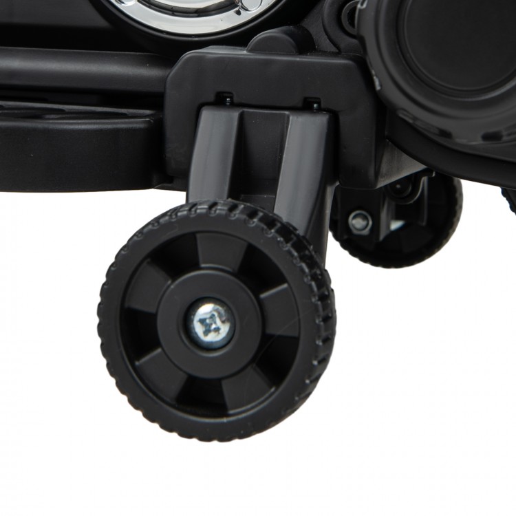 Close-up of the training wheels on the red Kids Electric Motorcycle, featuring durable design for stability and safety.