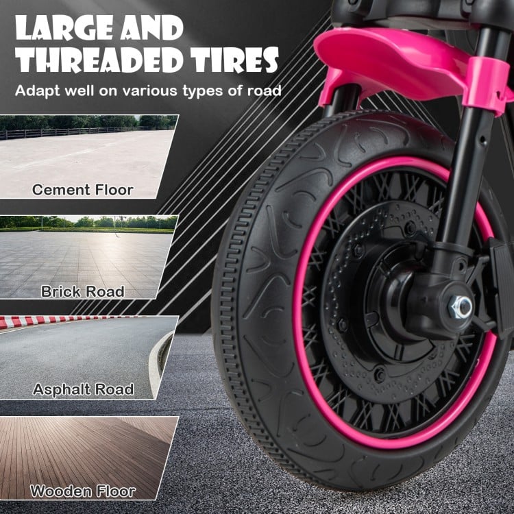 Large threaded tires of the pink kids electric motorcycle, suitable for various road types like cement and brick.