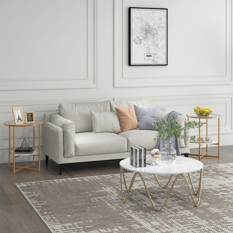 Round glass end table with faux marble shelf and gold tubes, ideal for living room or bedroom storage and display.